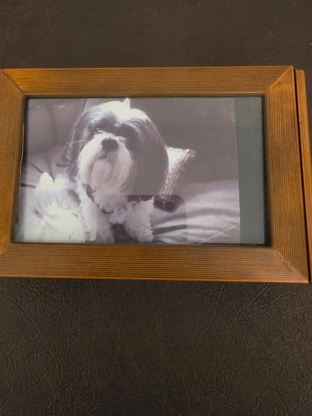 Vintage wooden jewelry box with a picture frame features a rectangular shape